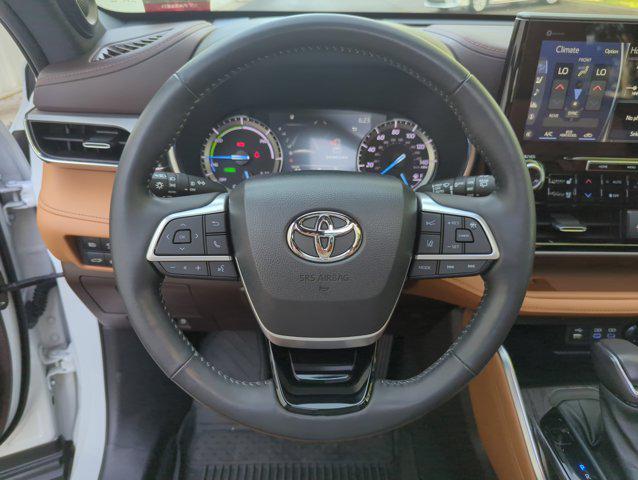 used 2022 Toyota Highlander Hybrid car, priced at $43,999