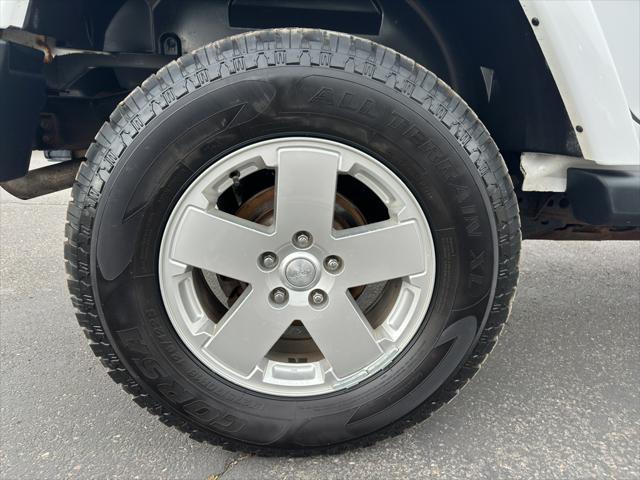 used 2012 Jeep Wrangler Unlimited car, priced at $17,995