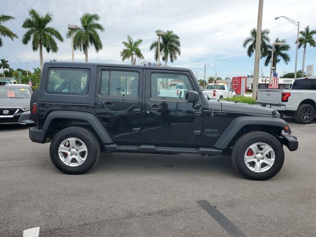 used 2014 Jeep Wrangler Unlimited car, priced at $14,880