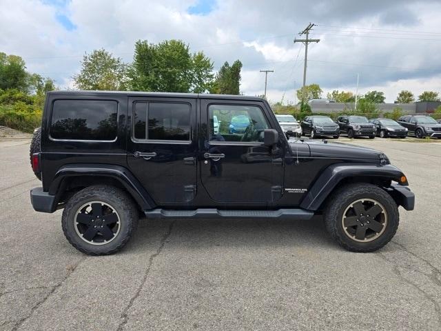 used 2012 Jeep Wrangler Unlimited car, priced at $11,483