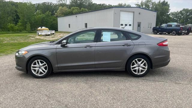 used 2013 Ford Fusion car, priced at $7,999
