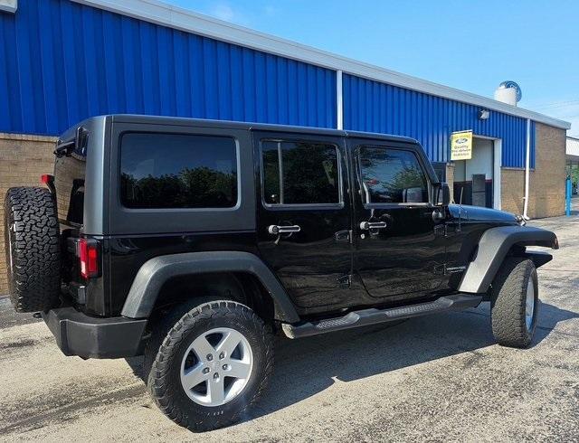 used 2018 Jeep Wrangler JK Unlimited car, priced at $21,989