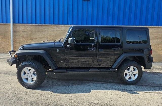 used 2018 Jeep Wrangler JK Unlimited car, priced at $21,989