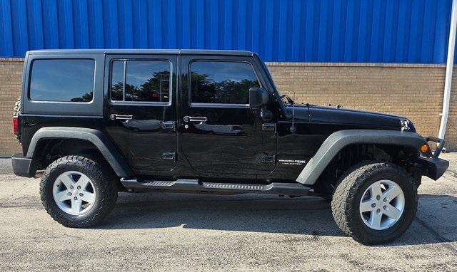 used 2018 Jeep Wrangler JK Unlimited car, priced at $21,989