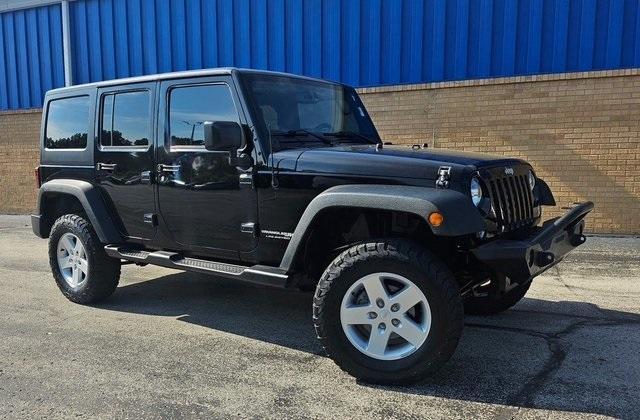 used 2018 Jeep Wrangler JK Unlimited car, priced at $21,989