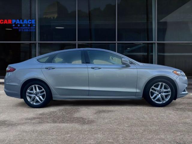 used 2016 Ford Fusion car, priced at $9,987