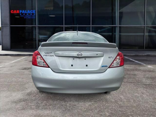 used 2014 Nissan Versa car, priced at $4,987