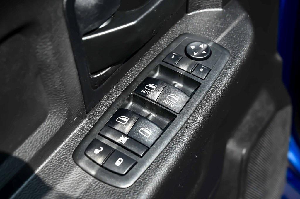 used 2018 Ram 1500 car, priced at $25,957