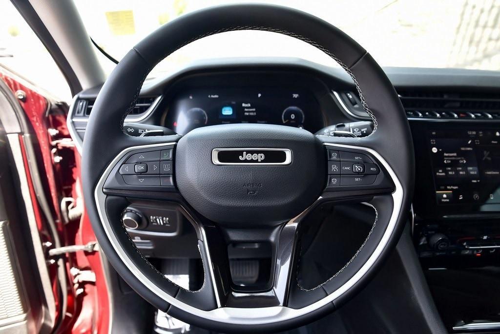 used 2023 Jeep Grand Cherokee car, priced at $30,511