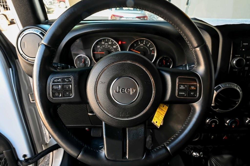 used 2017 Jeep Wrangler Unlimited car, priced at $23,511