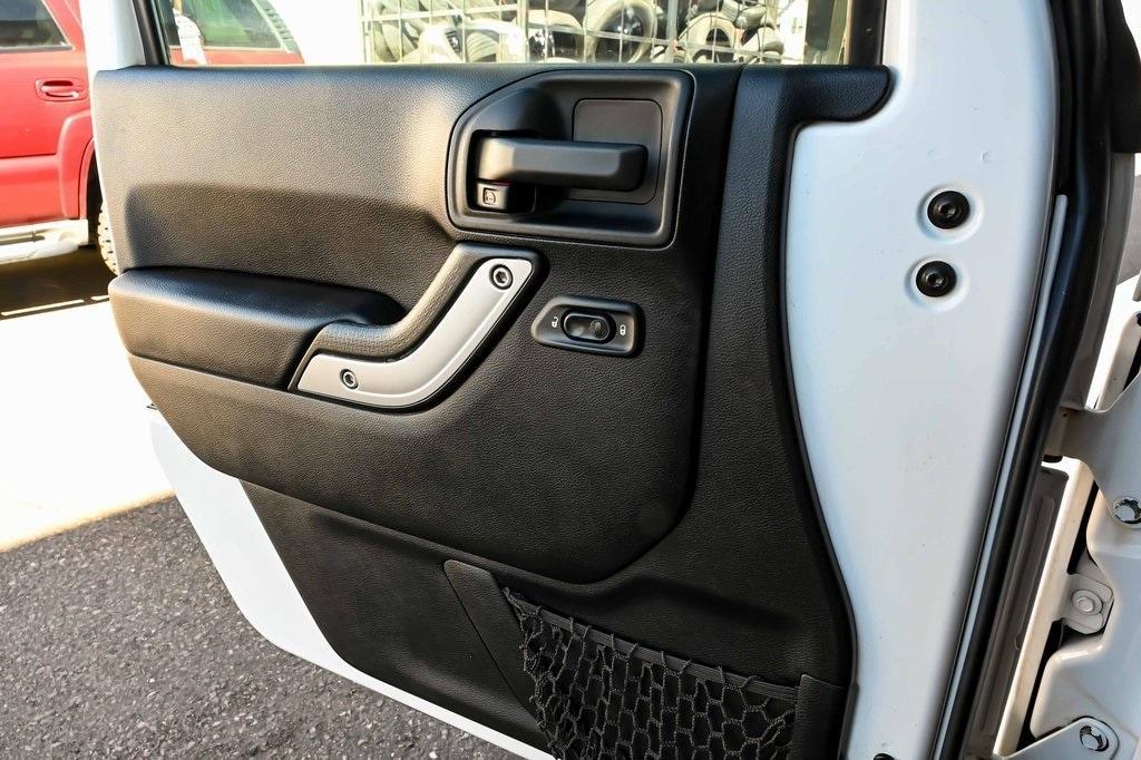 used 2017 Jeep Wrangler Unlimited car, priced at $23,391