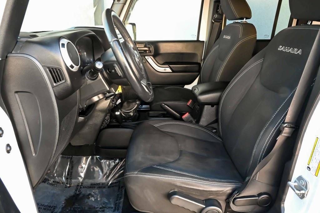 used 2017 Jeep Wrangler Unlimited car, priced at $23,391