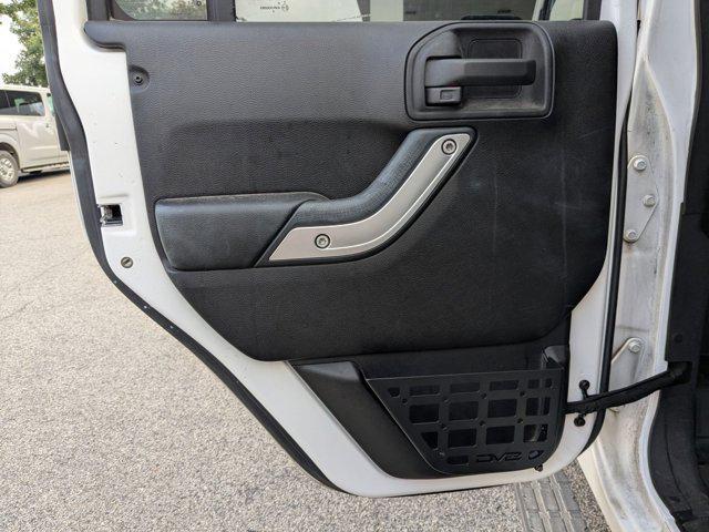 used 2015 Jeep Wrangler Unlimited car, priced at $18,227