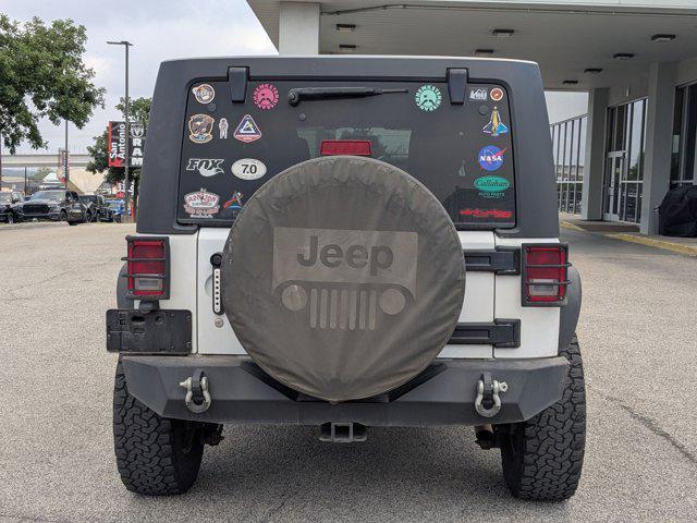 used 2015 Jeep Wrangler Unlimited car, priced at $18,227