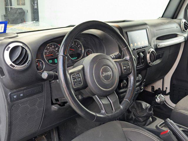 used 2015 Jeep Wrangler Unlimited car, priced at $18,227