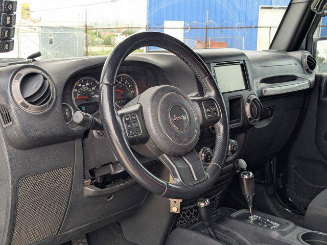 used 2015 Jeep Wrangler Unlimited car, priced at $15,887