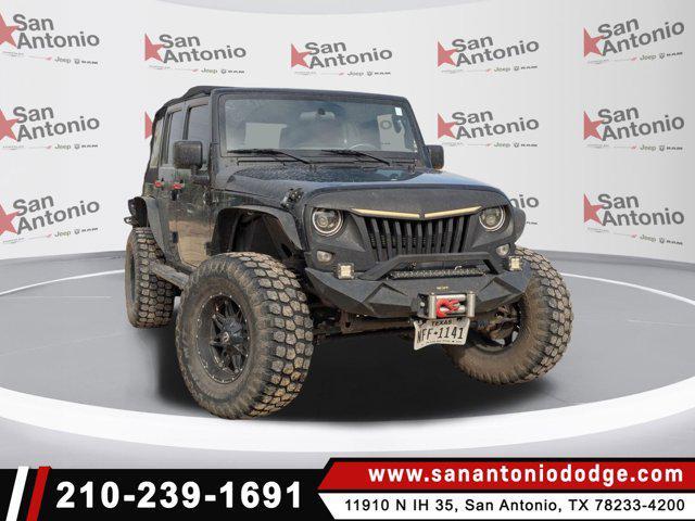 used 2015 Jeep Wrangler Unlimited car, priced at $15,887