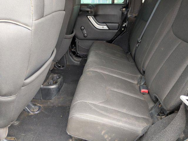 used 2015 Jeep Wrangler Unlimited car, priced at $15,887