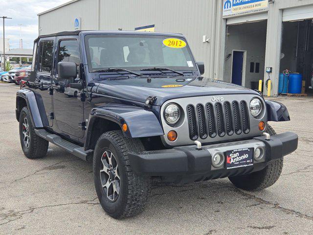 used 2012 Jeep Wrangler Unlimited car, priced at $13,901