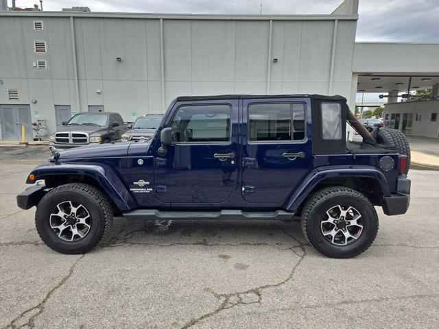 used 2012 Jeep Wrangler Unlimited car, priced at $13,901