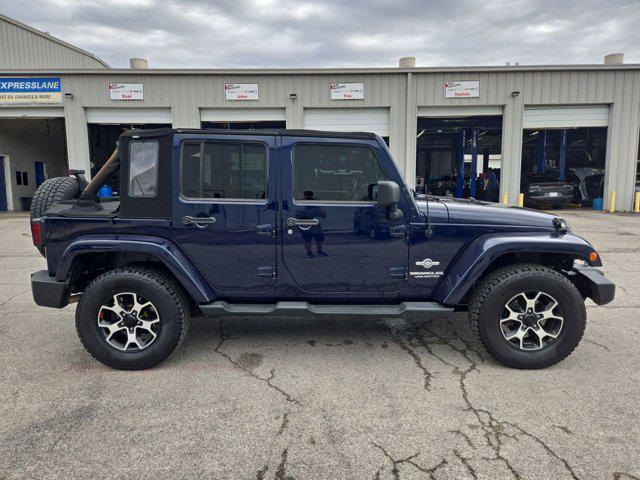 used 2012 Jeep Wrangler Unlimited car, priced at $13,901