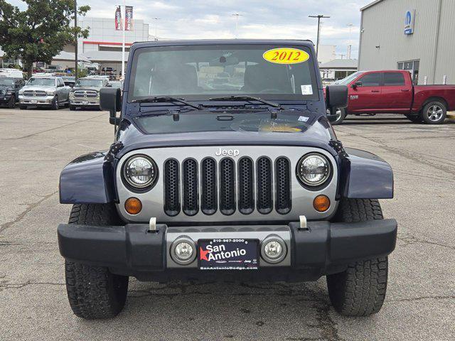 used 2012 Jeep Wrangler Unlimited car, priced at $13,901