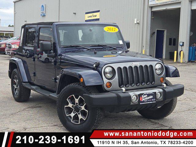 used 2012 Jeep Wrangler Unlimited car, priced at $13,901