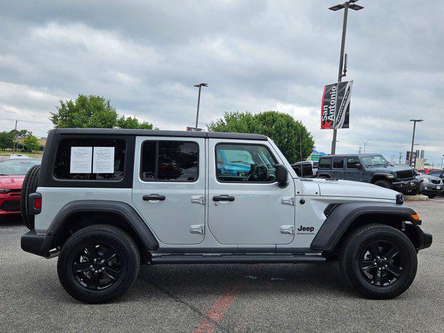 used 2023 Jeep Wrangler car, priced at $37,847