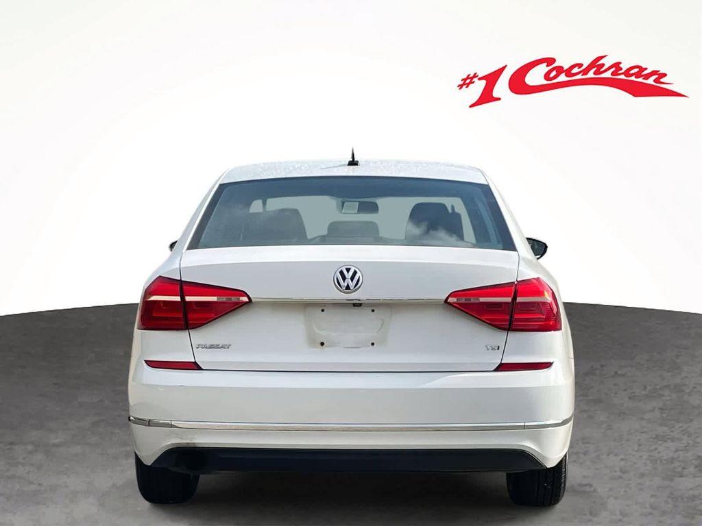 used 2016 Volkswagen Passat car, priced at $10,000