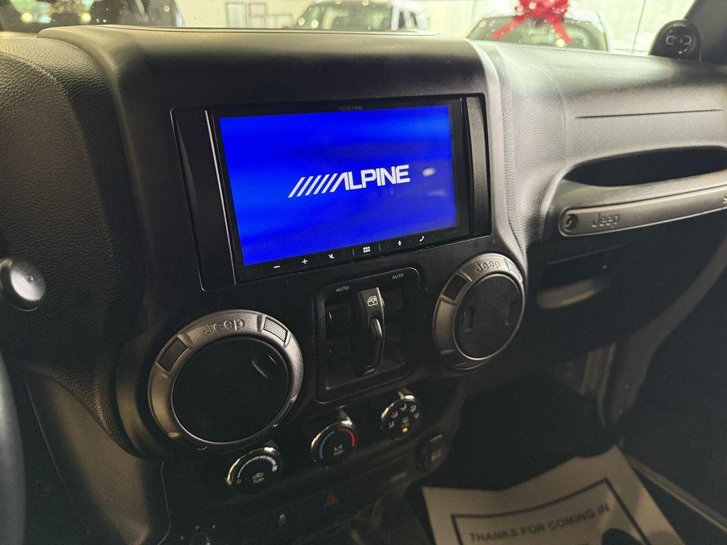 used 2012 Jeep Wrangler Unlimited car, priced at $12,935