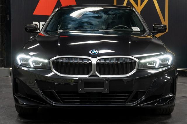 used 2023 BMW 330e car, priced at $31,981