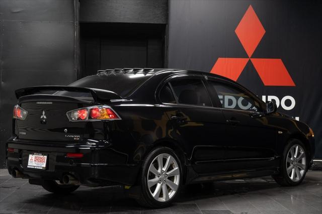 used 2014 Mitsubishi Lancer car, priced at $22,339
