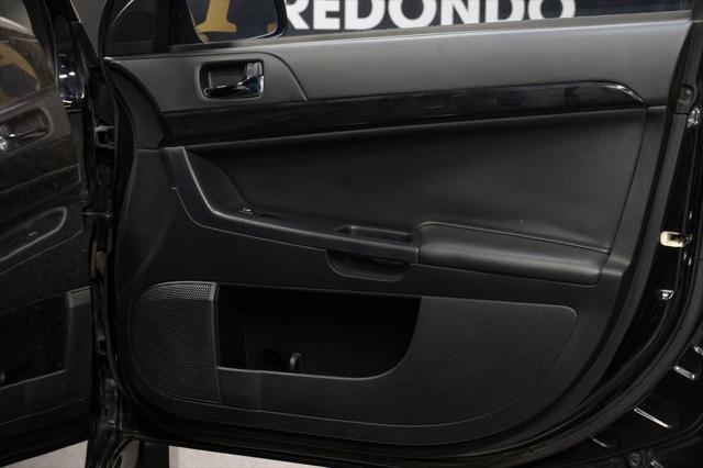 used 2014 Mitsubishi Lancer car, priced at $22,339