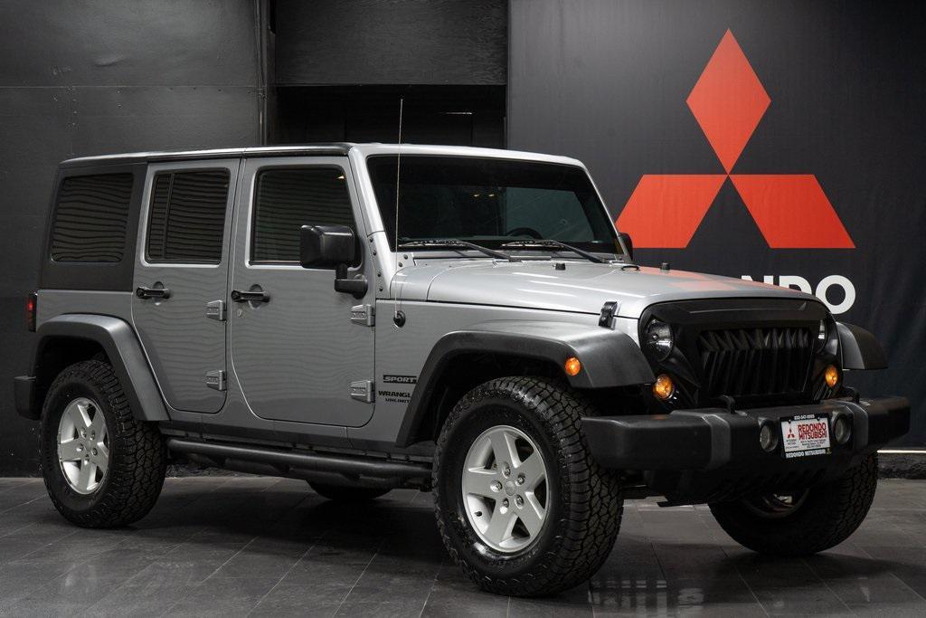 used 2016 Jeep Wrangler Unlimited car, priced at $18,999