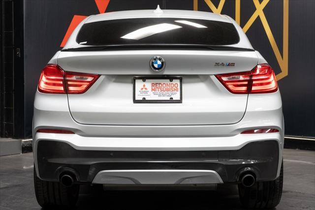 used 2018 BMW X4 car, priced at $25,997