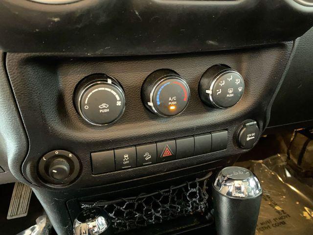 used 2015 Jeep Wrangler Unlimited car, priced at $16,998