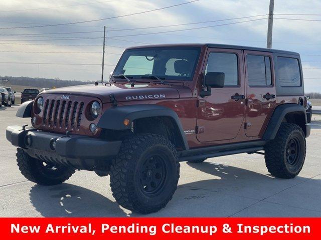 used 2014 Jeep Wrangler Unlimited car, priced at $15,988