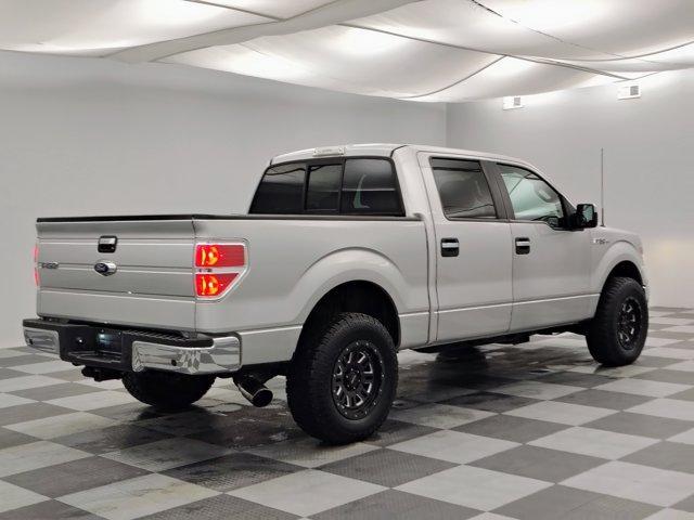used 2014 Ford F-150 car, priced at $14,988