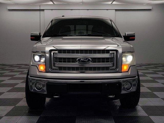 used 2014 Ford F-150 car, priced at $14,988