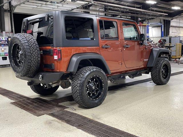 used 2014 Jeep Wrangler Unlimited car, priced at $23,588