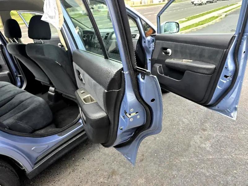 used 2010 Nissan Versa car, priced at $4,800