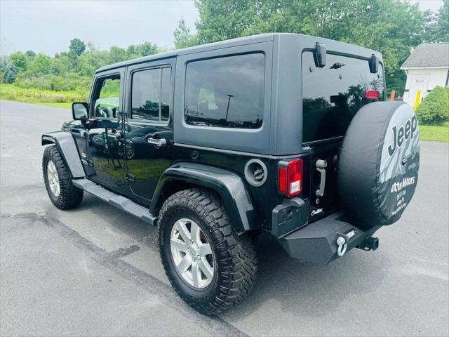 used 2015 Jeep Wrangler Unlimited car, priced at $18,900