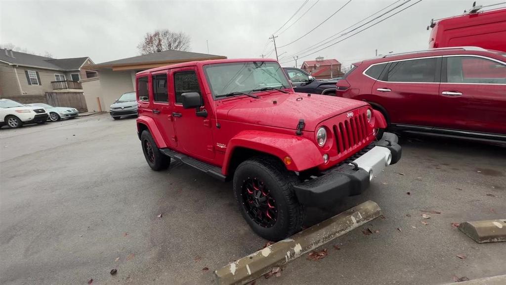 used 2014 Jeep Wrangler Unlimited car, priced at $15,538