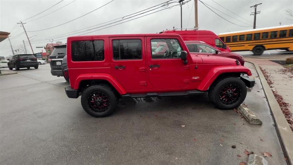 used 2014 Jeep Wrangler Unlimited car, priced at $15,538