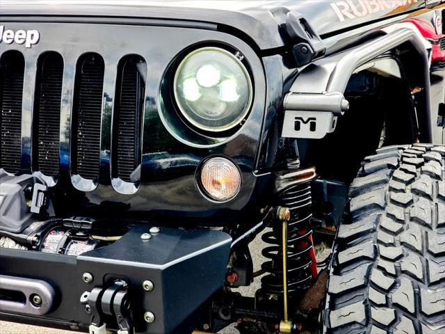 used 2015 Jeep Wrangler Unlimited car, priced at $21,800