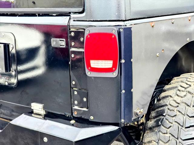 used 2015 Jeep Wrangler Unlimited car, priced at $21,800