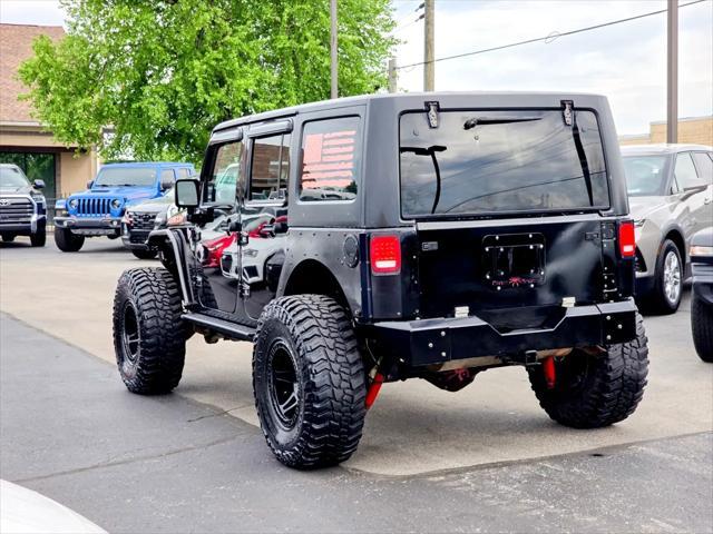 used 2015 Jeep Wrangler Unlimited car, priced at $21,800