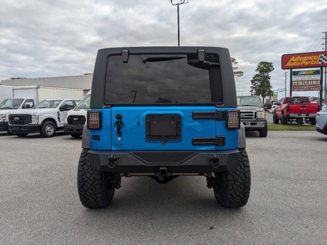 used 2015 Jeep Wrangler Unlimited car, priced at $17,900