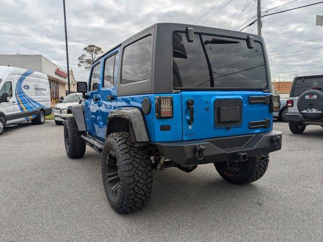 used 2015 Jeep Wrangler Unlimited car, priced at $17,900