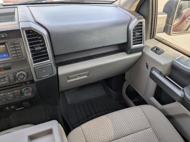 used 2015 Ford F-150 car, priced at $18,000